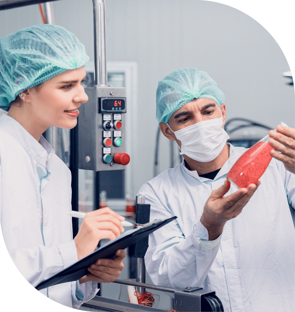 Scientists examining lab-grown meat in laboratory.